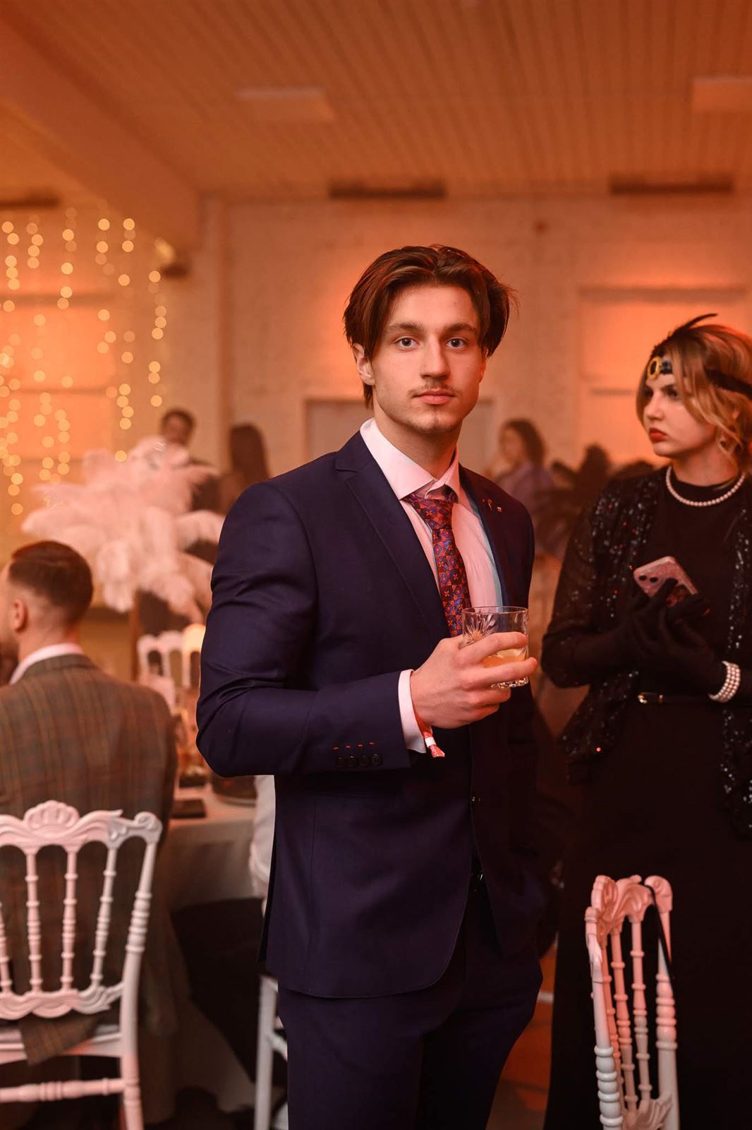 Rinalds Dērics in a dark suit, portrait at a gala evening